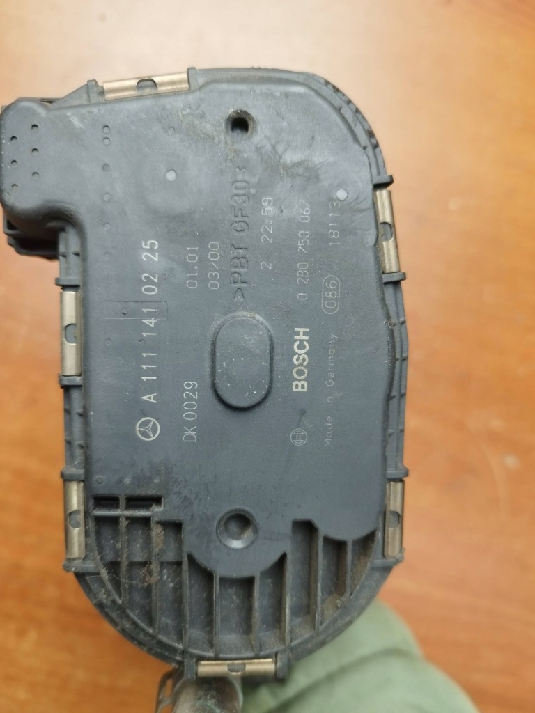 Дросельна заслінка mercedes w203 1111410225 в Україні