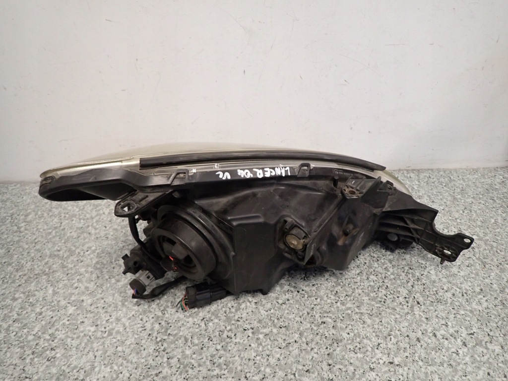 фото №8, Mitsubishi lancer vii 04- лампа передняя левая фара