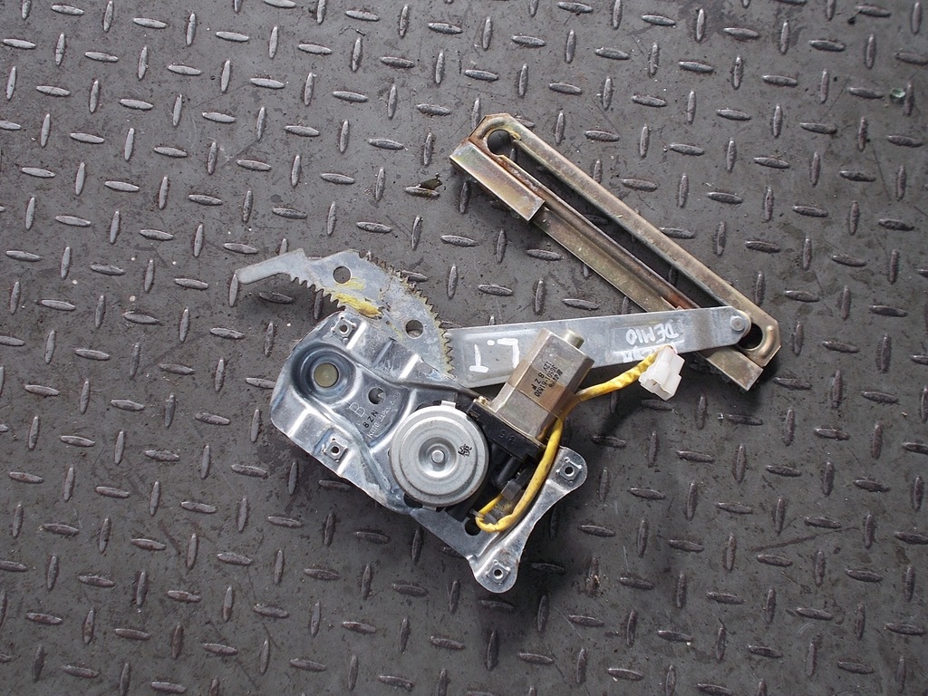 фото №1, Підйомник електричний лівий задня mazda demio 96-99