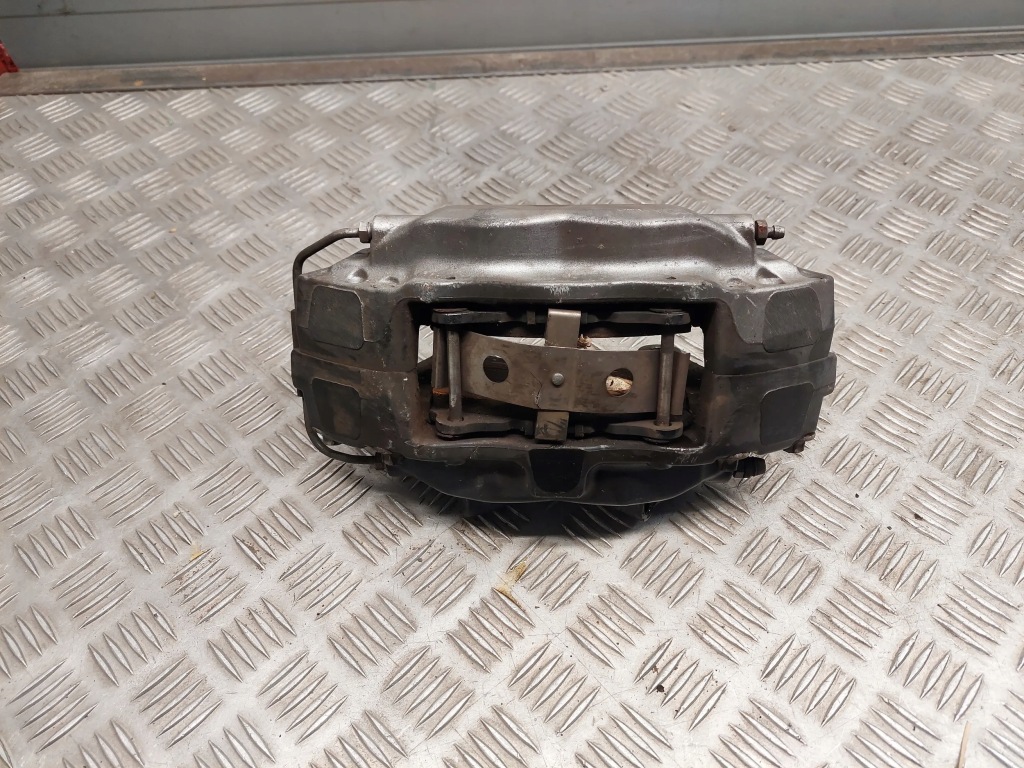 фото №1, Tesla model s перед сторона левая суппорты