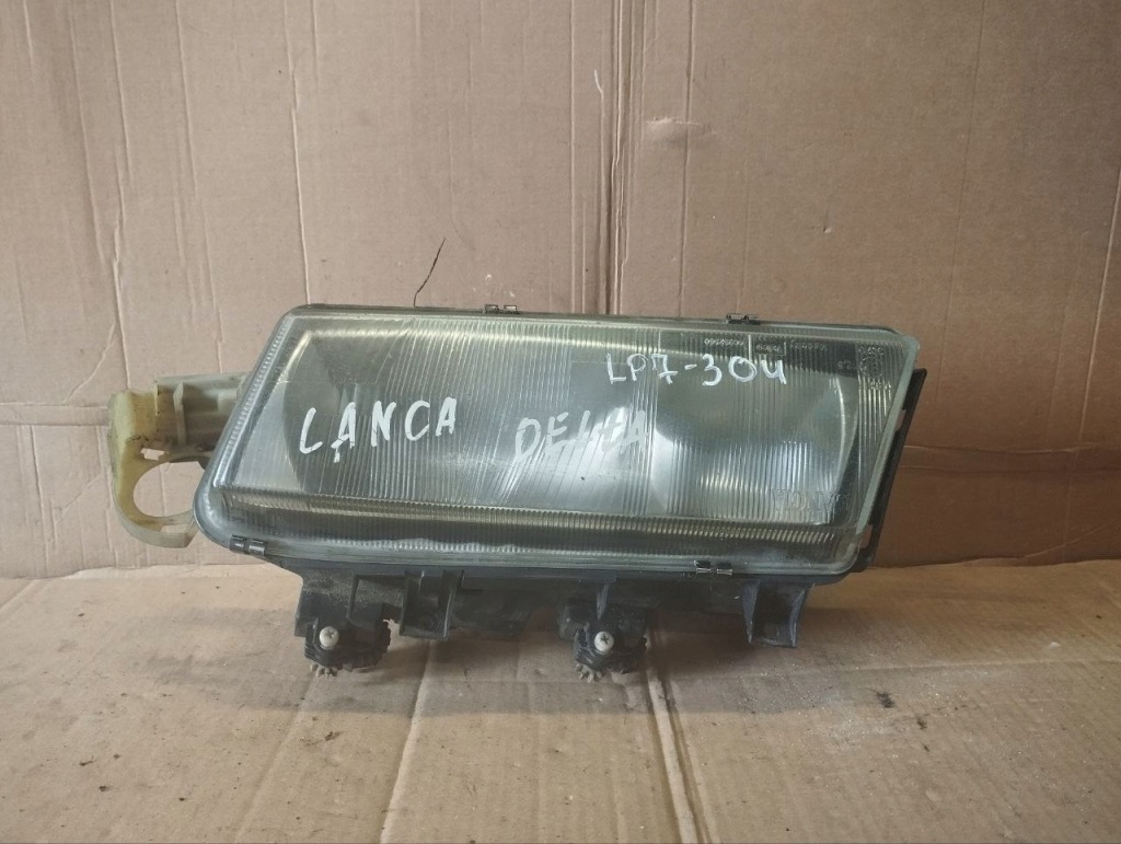 Купить Лампа левая передняя левый перед lancia delta 88200432