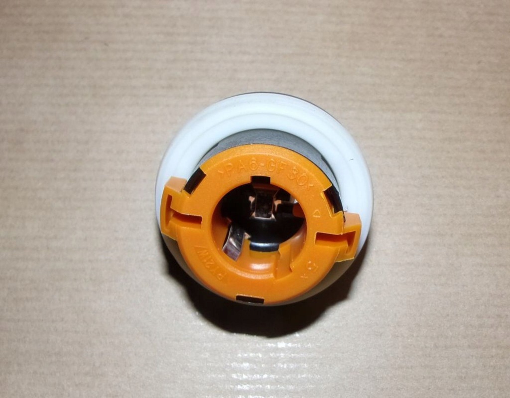 фото №1, Вкладыш цоколь лампы поворотник