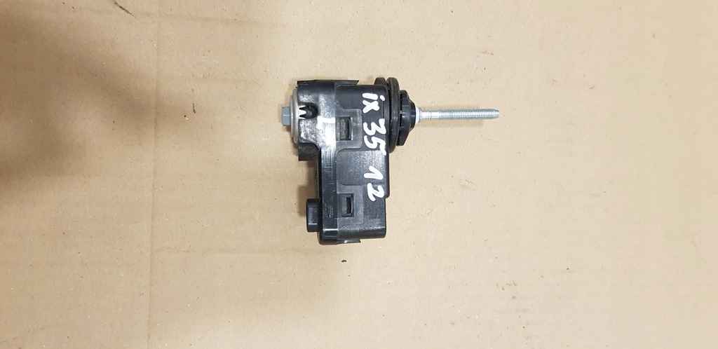 фото №1, Hyundai ix35 10-15 моторчик регулювання лампи