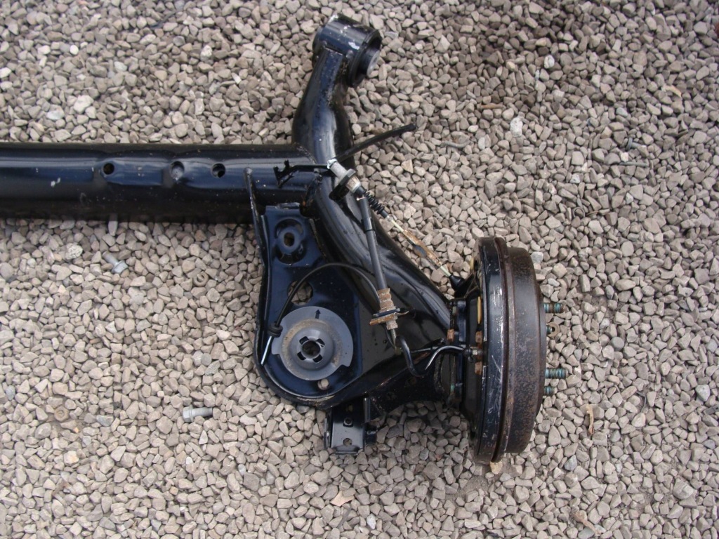 Балка вісь  задня mazda 2 de Ціна