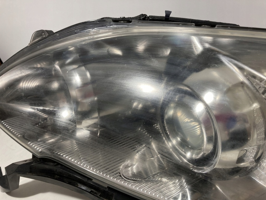 фото №9, Toyota avensis t25 лампа ліва 2003-2006 фара