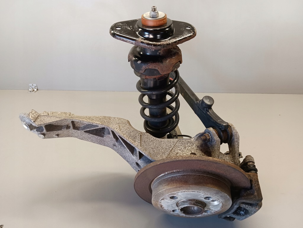 фото №2, Поворотний кулак важіль амортизатор лівий задня mini cooper ii r55 r56 clubman