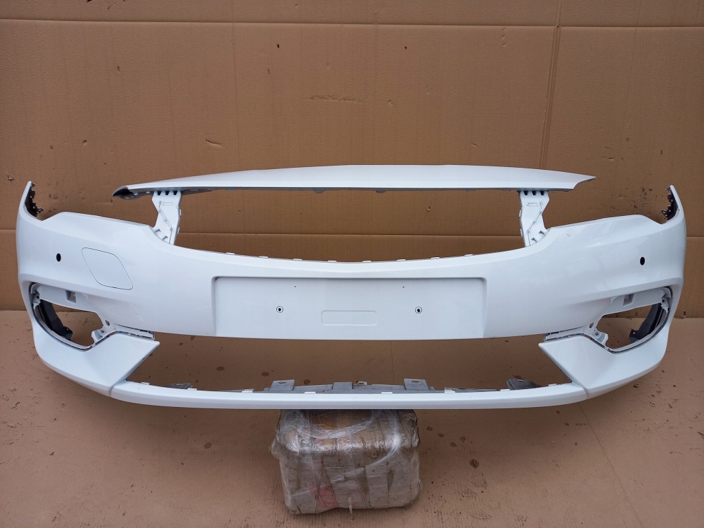 Купить Opel оригинальный номер 39052730 бампер