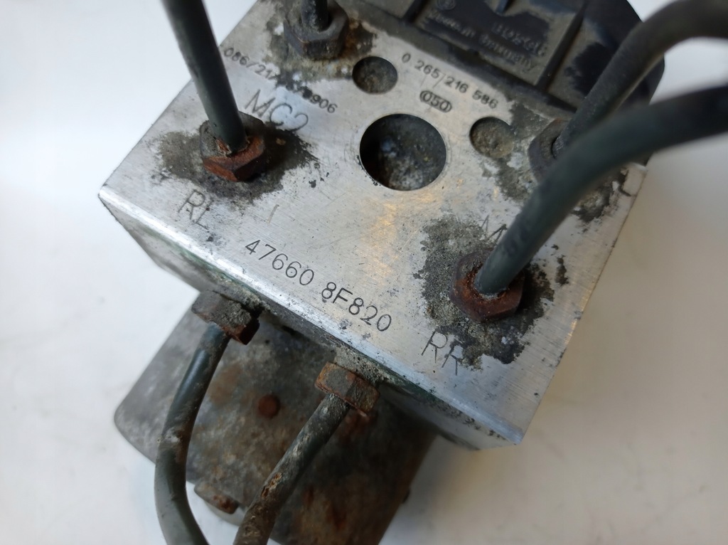 фото №7, Насос abs nissan primera p11 476608f820