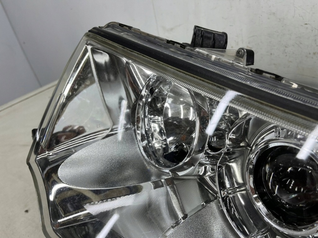 фото №15, Лампа фара mitsubishi l200 lift 10-15r. pajero sport 03-16r левый перед