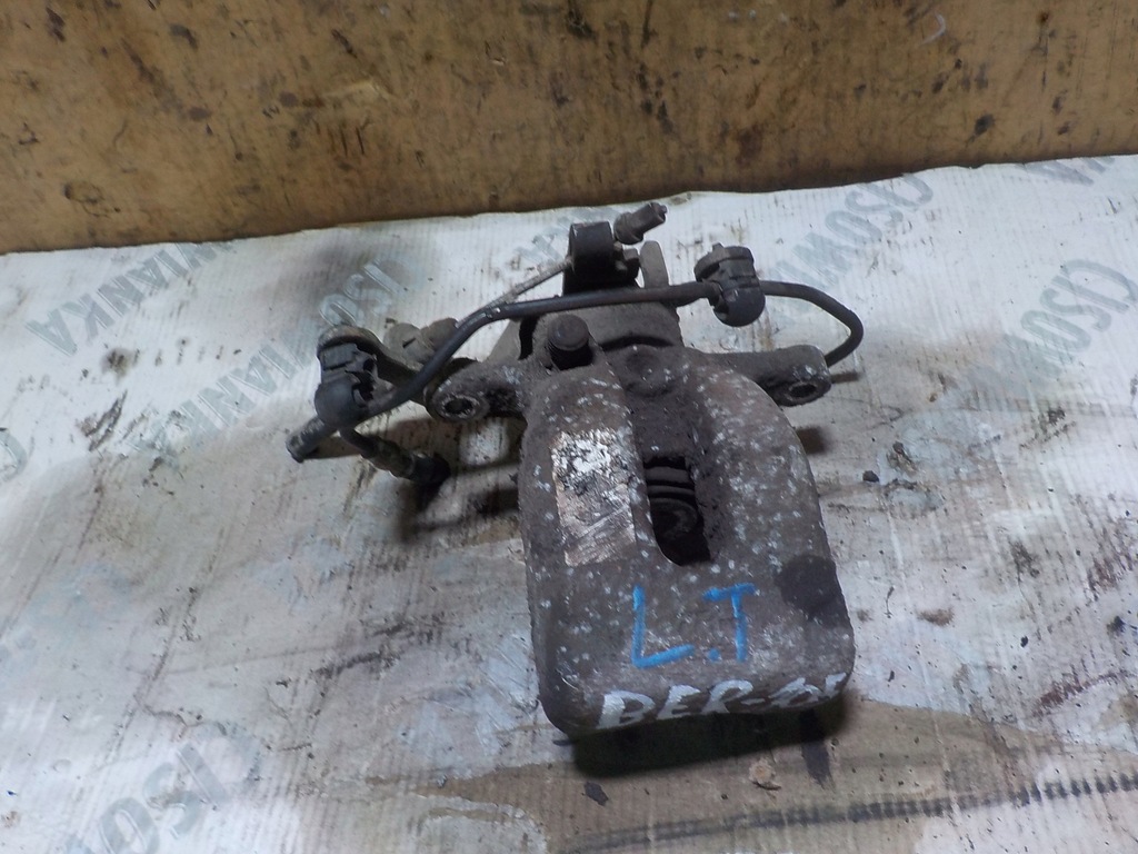 фото №1, Citroen berlingo ii 1.6ehdi суппорт тормозной левый задняя
