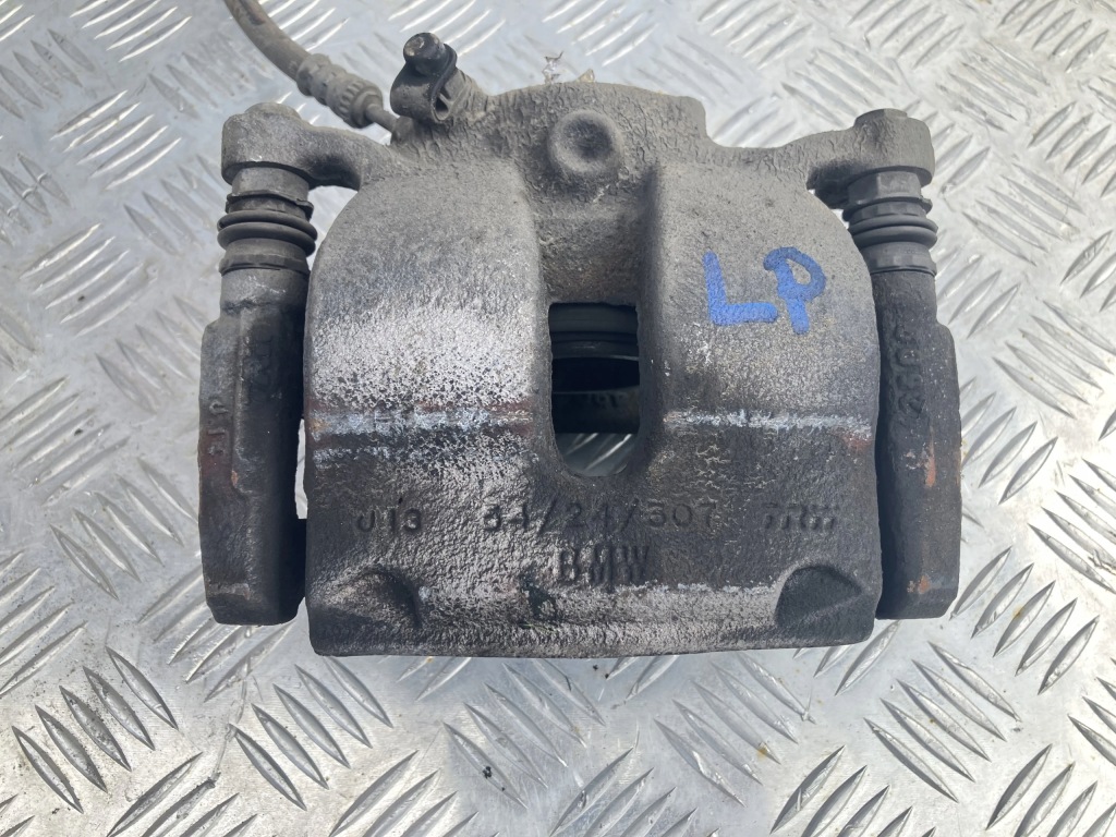 фото №1, Суппорт тормозной перед левый bmw 1 f40 1.5 d