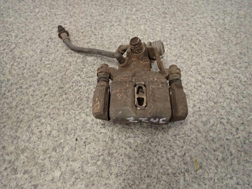 фото №1, Honda jazz 02-08 суппорт задний левый задняя