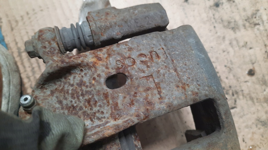 фото №7, Супорт гальмівний лівий перед volvo s40 v40