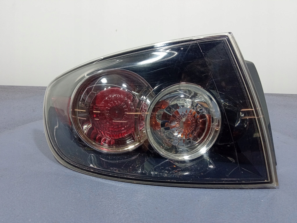 фото №1, Mazda 3 i bk lift sedan 06- лампа задня ліва зовнішня p6340