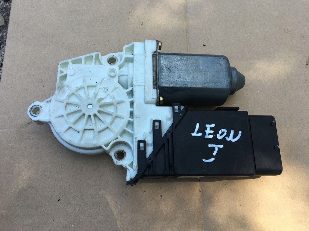 фото №1, Моторчик стекло перед правый leon i оригинал