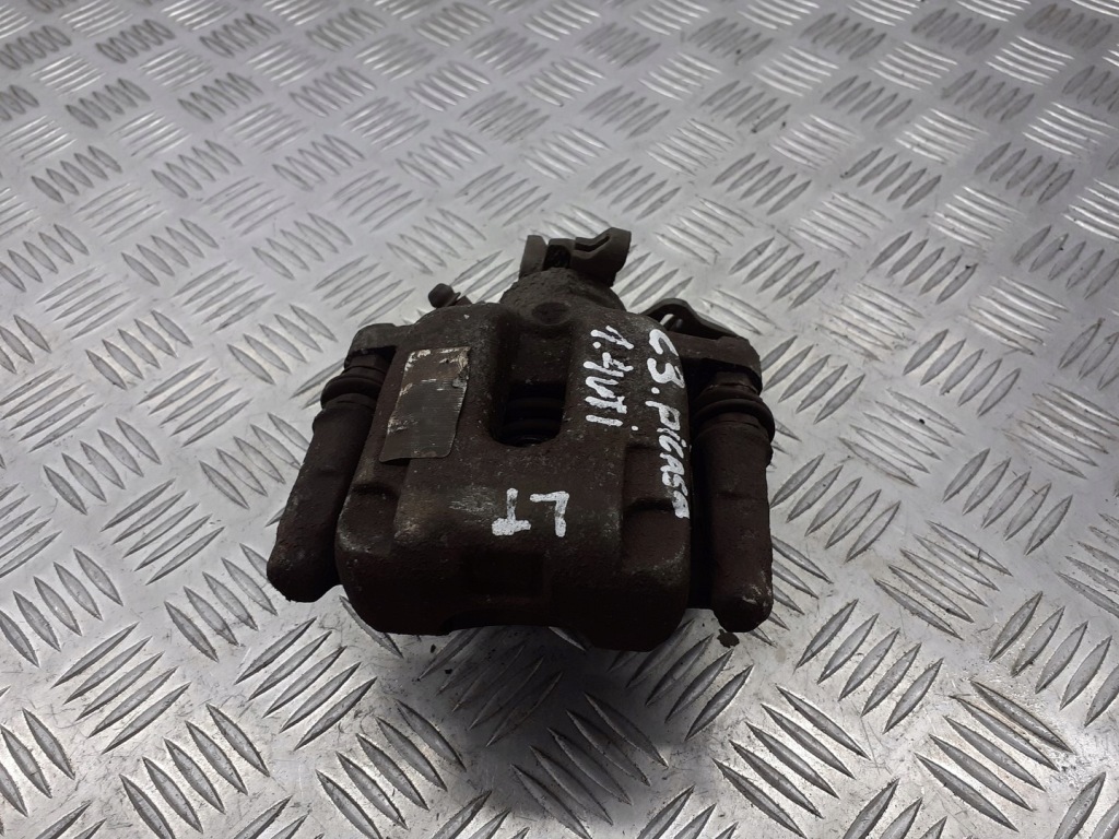 фото №1, Суппорт тормозной левый задняя citroen c3 picasso 1.4