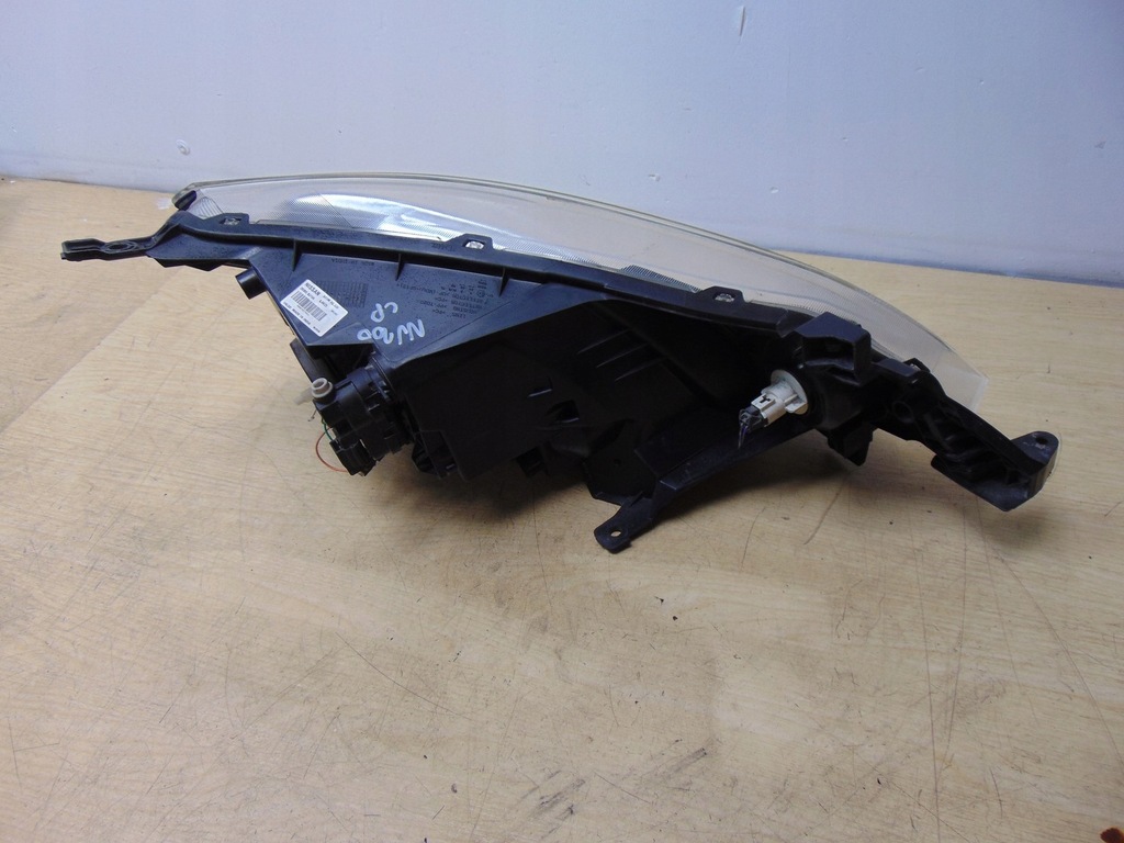 фото №9, Лампа левая перед nissan nv200 оригинал europa