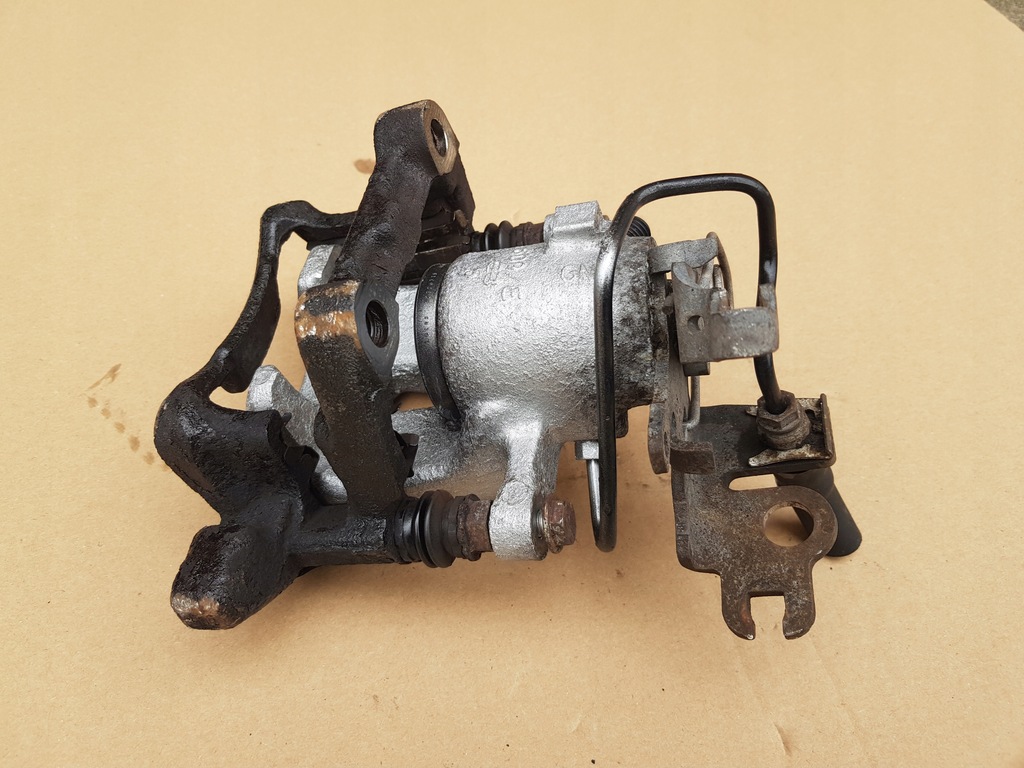 фото №16, Супорт гальмівний + скоба лівий задня / vw caddy iii / 41mm 256mm перевірений