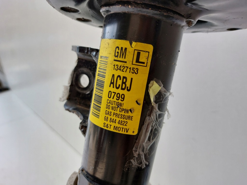 фото №4, Opel cascada амортизатор поворотный кулак левый перед