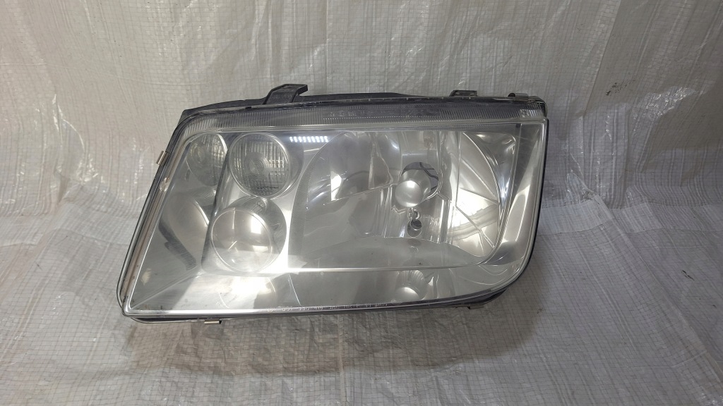 Купити Vw bora лампа передня ліва фара 1eh963560-63
