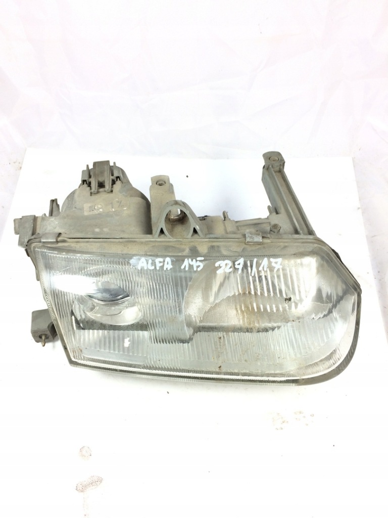 Купити Фара лампа передня alfa romeo 145 hella