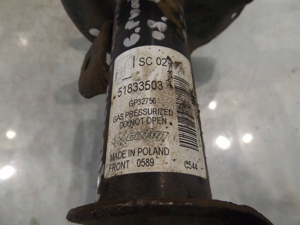 фото №2, Grande punto 1,2 амортизатор лівий перед