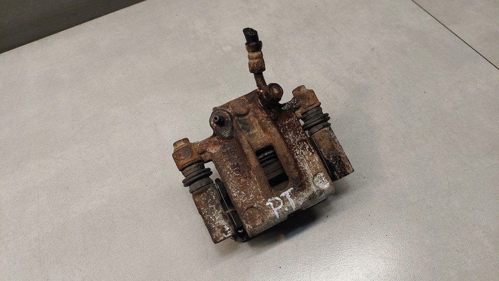 фото №6, Супорт гальмівний правий задня corolla e12 1.4 b