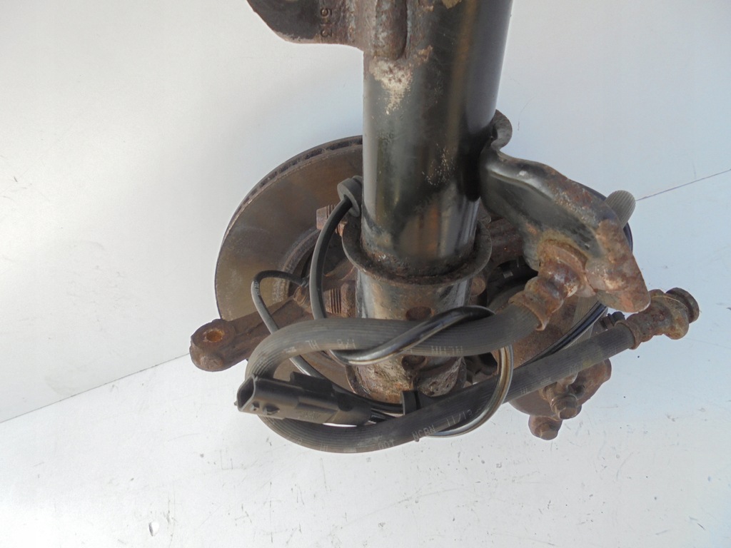 фото №10, Nissan note ii e12 амортизаторна стійка поворотний кулак ліва