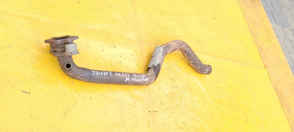 фото №8, Гасник передній toledo ii 1,4b do колектор