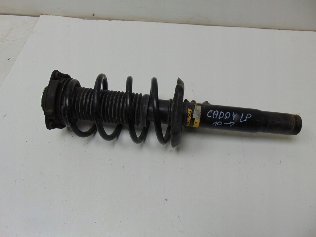 фото №7, Амортизатор левый перед vw caddy 2010- g16495