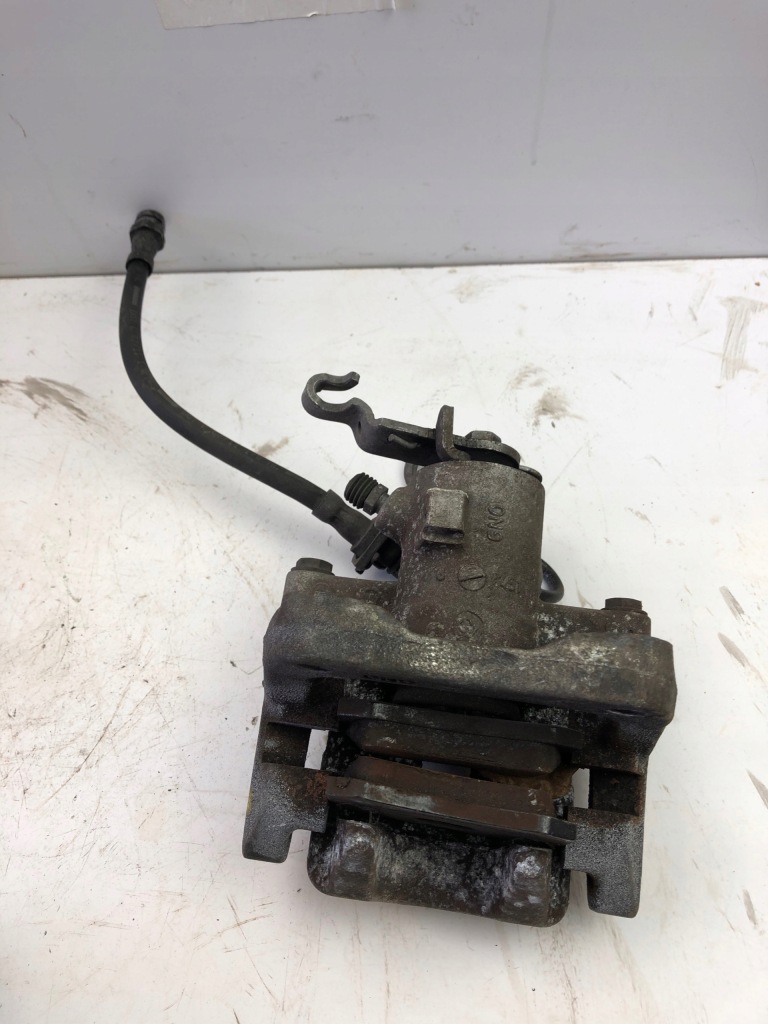 фото №1, Vw golf touran супорт гальмівний trw лівий задня