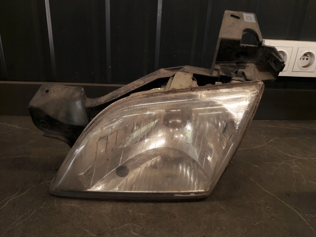 Купити 16521697a фара лівий opel sintra