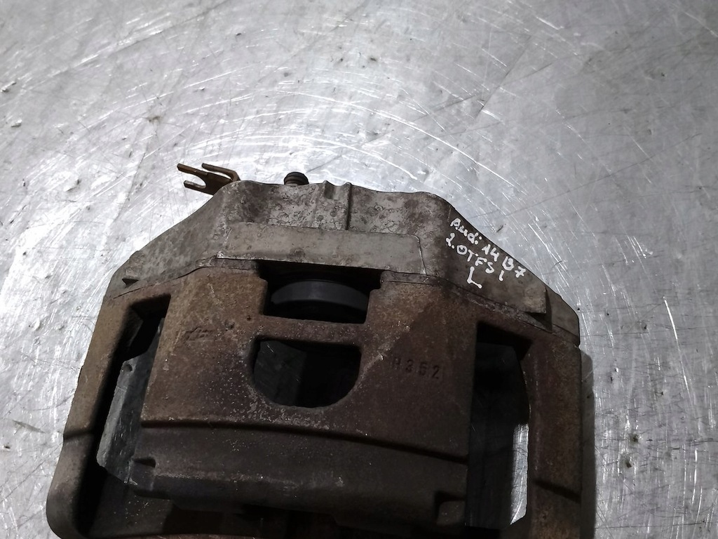 фото №1, Супорт гальмівний лівий перед audi a4 b7 2.0