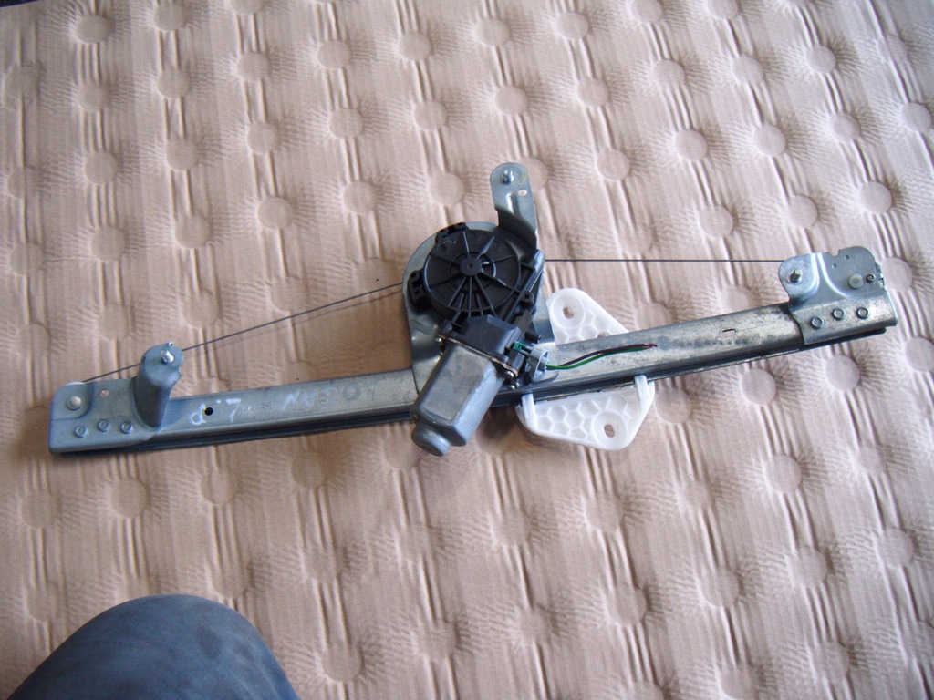 фото №1, Dacia logan механизм стекло левый перед