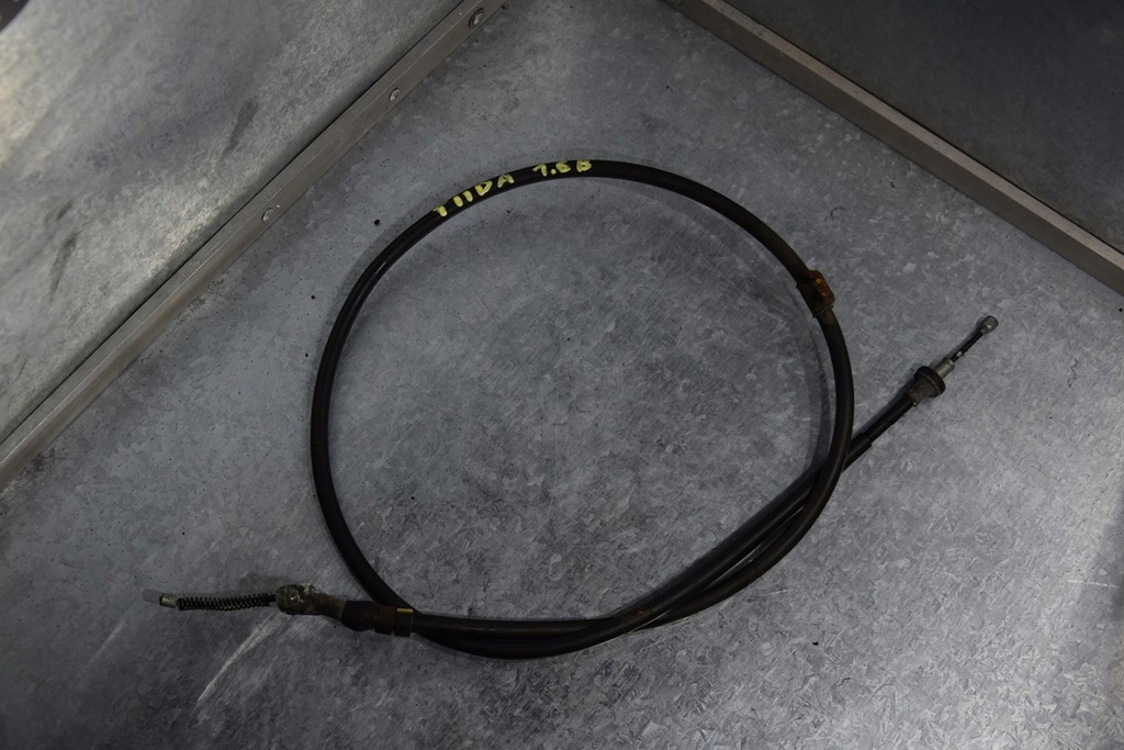 фото №1, Nissan tiida трос тормоза ручного