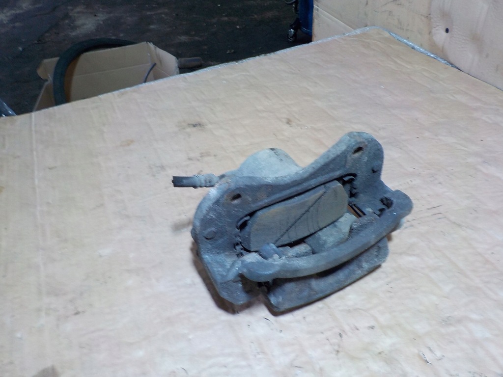 фото №4, Hyundai ix35 супорт гальмівний лівий перед