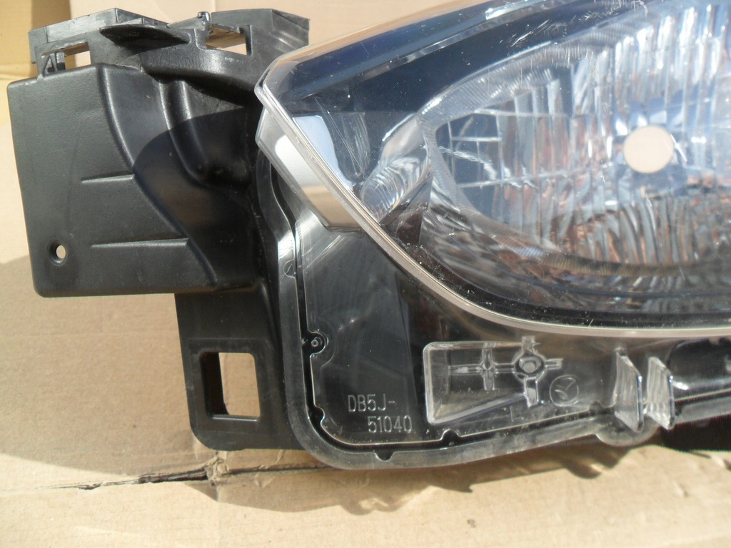 фото №14, Mazda 2 лампа левая обычная