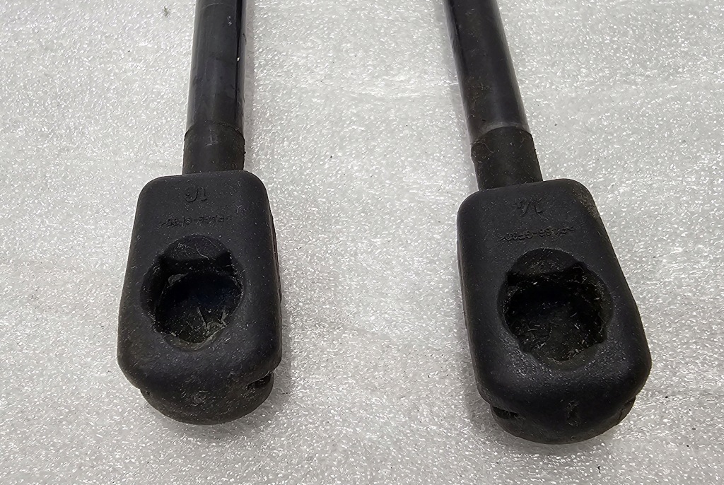 Оригинал  привод пневматический капота левое  + правый  mini r55 r56 r57 r58 r59 Цена