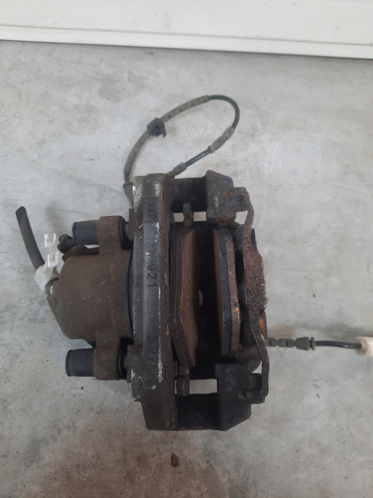 фото №6, Супорт гальмівний лівий перед bmw x1 e84