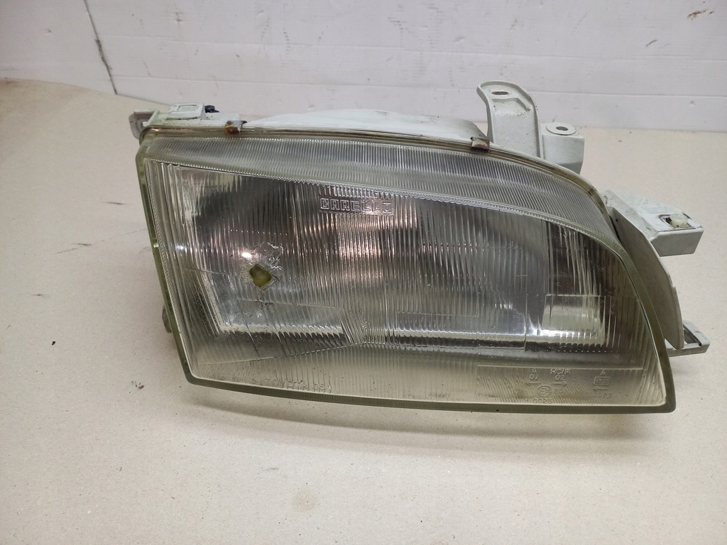 фото №1, Toyota carina e 92-97 фара лампа перед правая carello