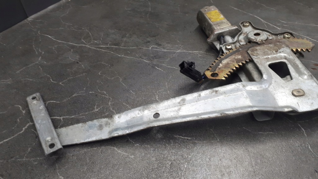 фото №9, Механізм скло лівий задня nissan sunny y10