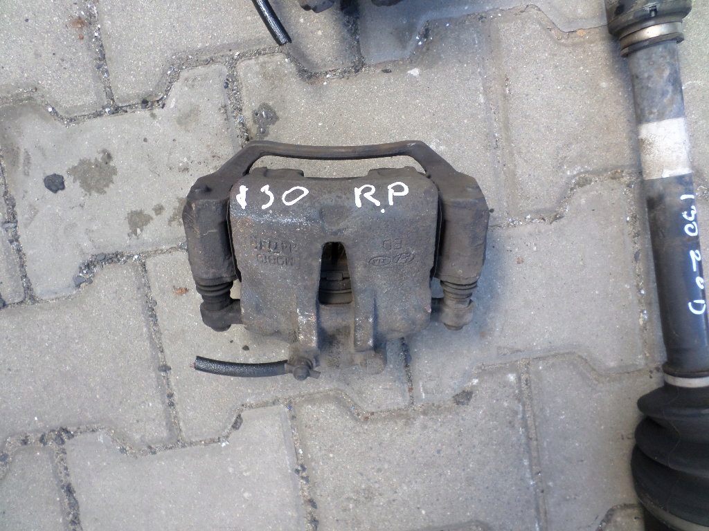 фото №1, Hyundai i30 07-12 суппорт тормоза правый передний