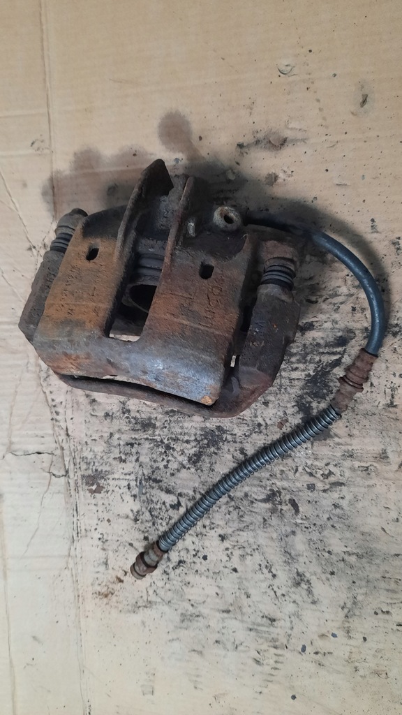 фото №1, Супорт гальмівний лівий перед volvo v40 s40