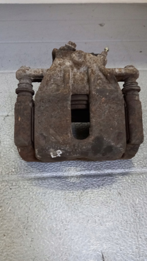 фото №1, Суппорт левый перед nissan note 1.4b 06r