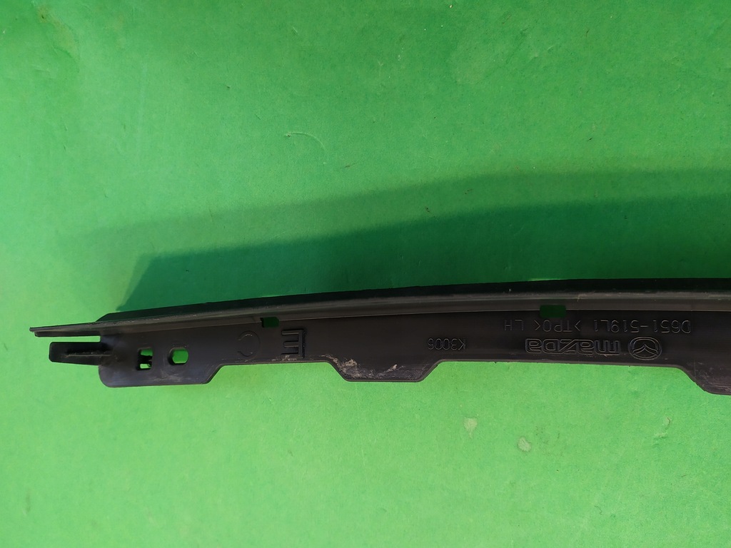 фото №11, Молдинг бампера левая перед mazda 2 sport