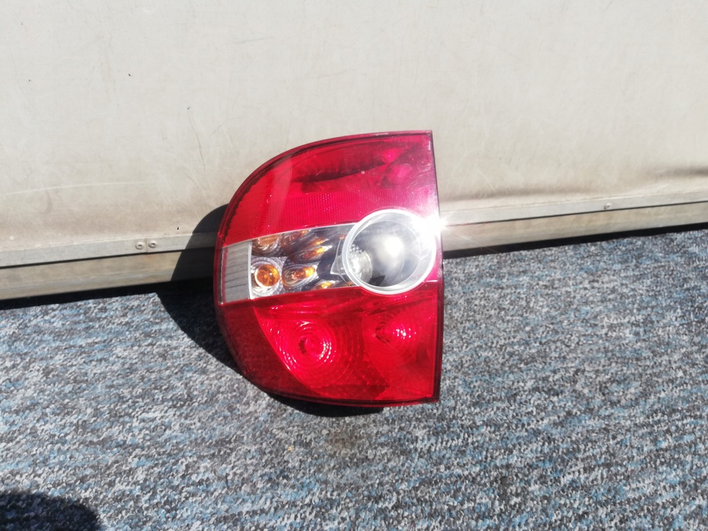 фото №1, Лампа задняя левая vw fox 05-11