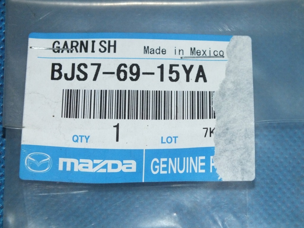 фото №4, Mazda 3 bm 13- заглушка трикутник правий перед