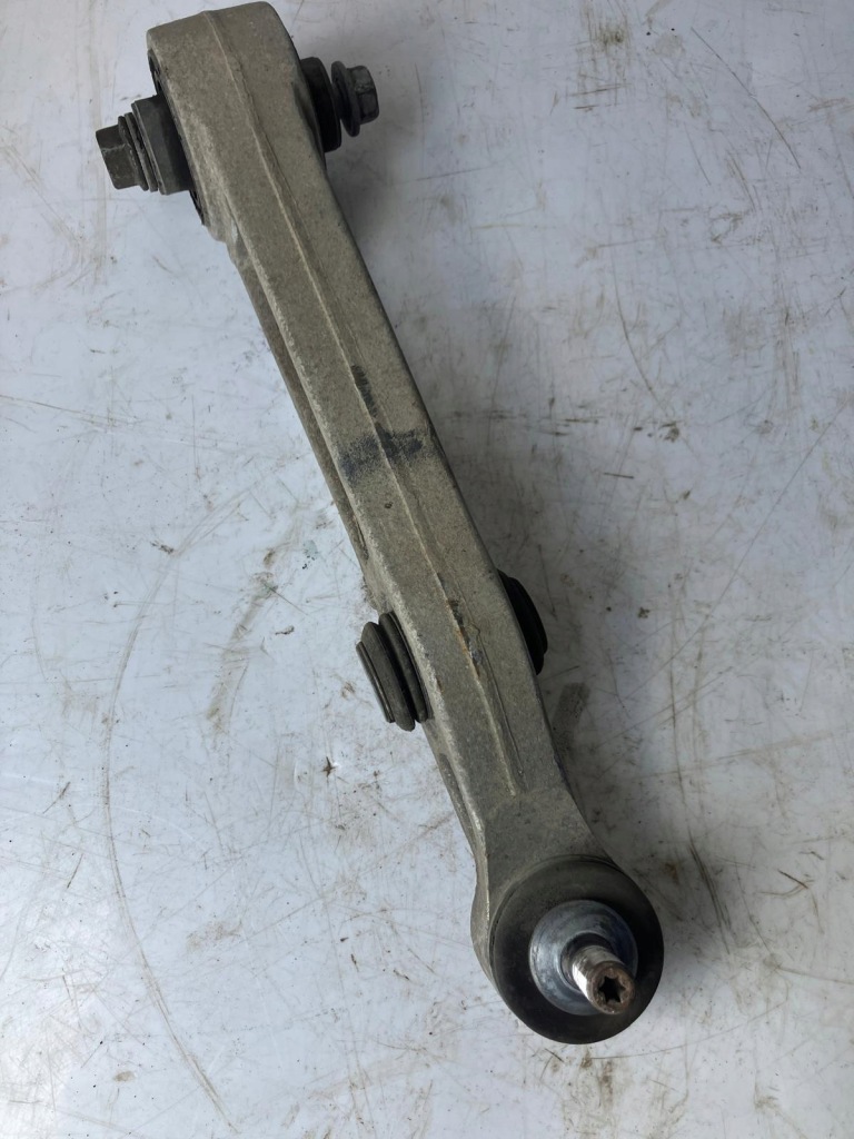 Купити Важіль лівий перед tesla model s awd 1048951-00 нижній