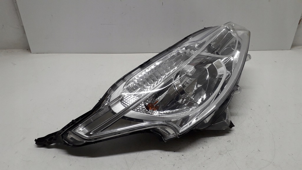 фото №13, Peugeot 208 1 i 12- лампа правая перед 9802221280