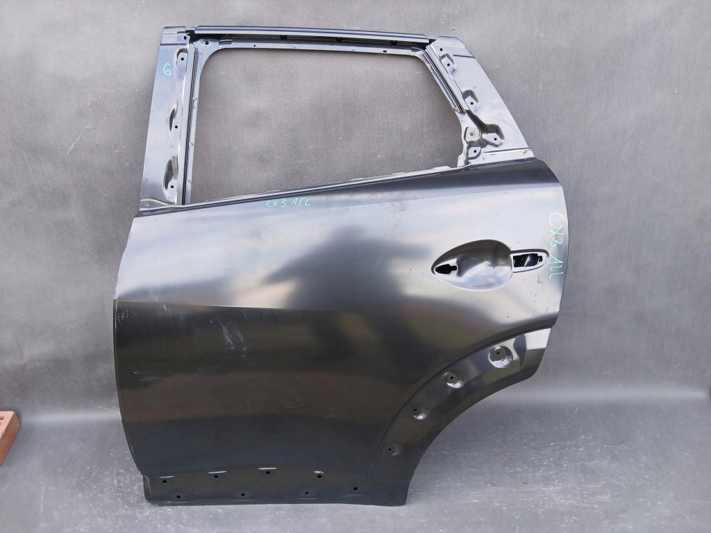 фото №1, Mazda оригінальний номер d10e73010 двері молдинг